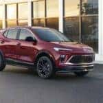 Maroon Buick Encore GX SUV White Building