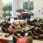 Range Rover Sport on display alongside Tremble Rose and lemon sparkling water at a Pilates class hosted by Land Rover North Dade in its North Miami showroom.
