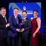 Pictured from left: Outstanding Business Leader Awards Emcee Steve Madincea, Northwood University President Kent MacDonald, Larry Zinn ‘08, and Bella Smylie. Larry accepted the award on behalf of his father, Warren Henry Zinn ’77.