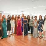 Group photo of female student-athletes at the first-ever Tournament of Champions HER Awards hosted by Warren Henry Auto Group headquarters in North Miami, Florida. The HER Awards celebrate outstanding high school athletes from South Florida, recognizing achievements in athletics, leadership, community involvement, and academic excellence across multiple sports.