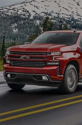 Red Chevrolet Truck on road.